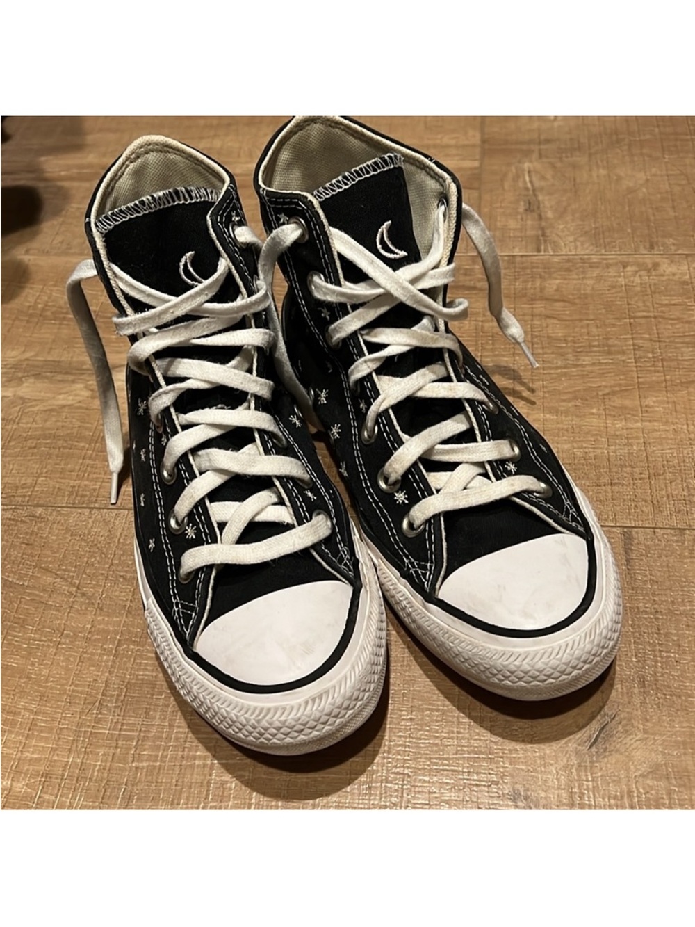 Converse Black and White High-Top Sneakers with Star Detail